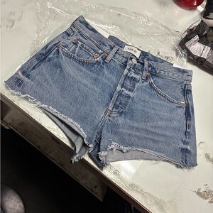 Agolde Light Blue Distressed Denim Cutoff Shorts